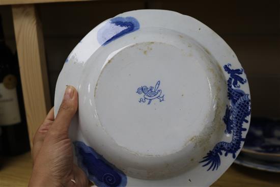 A Dutch Delft plate and two blue and white English dishes plate diameter 27cm